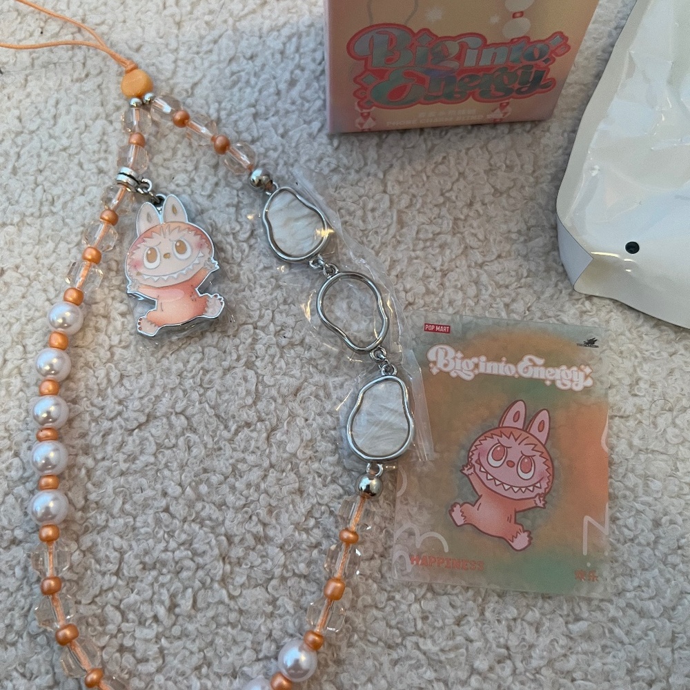 Pop Mart Labubu big into energy phone charms